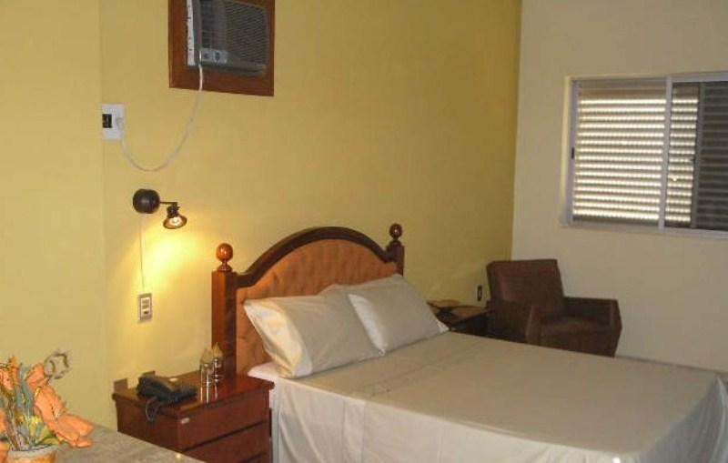 Rodes Palace Hotel Patrocinio Room photo